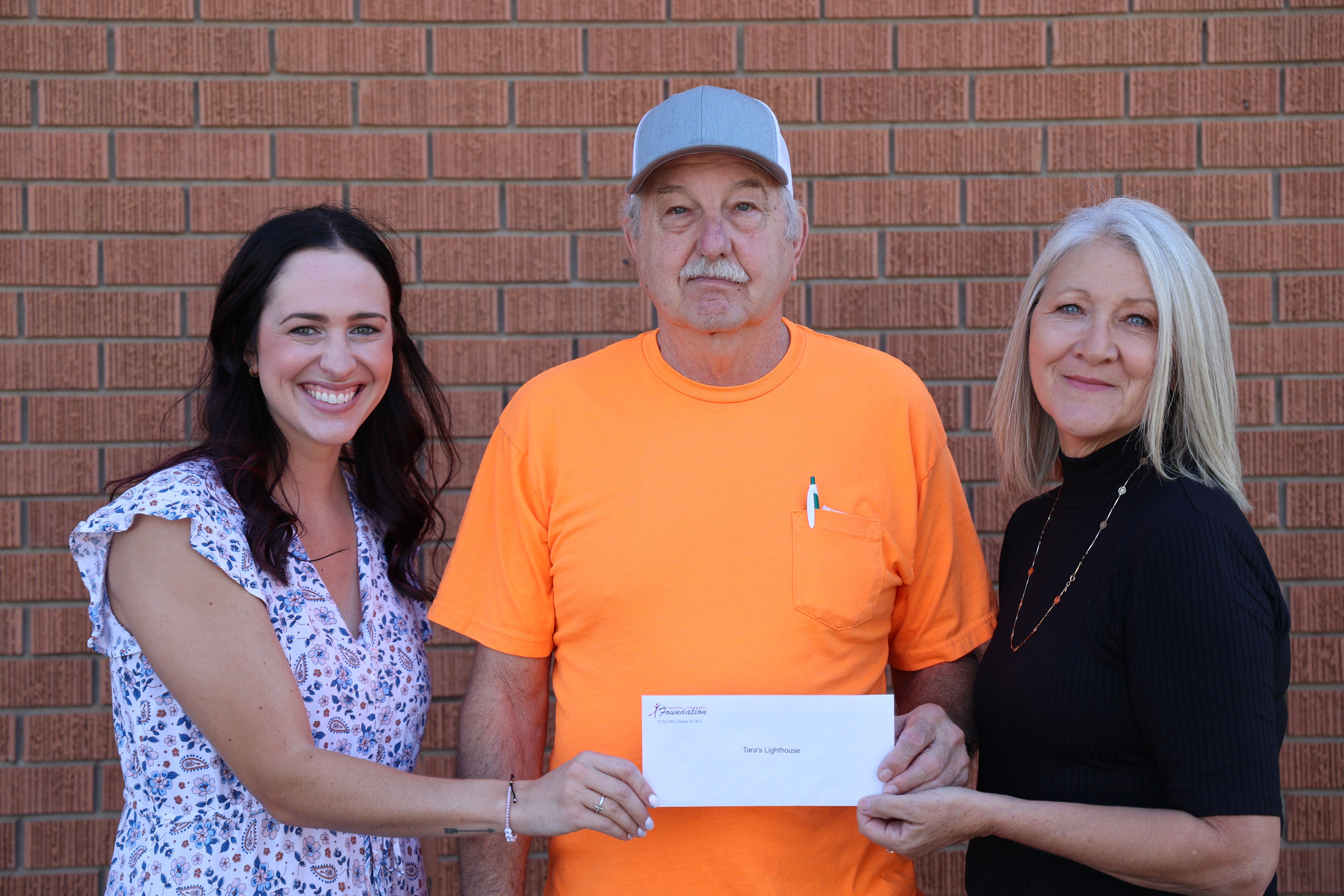 From left to right) Erin Talley, Central Community Foundation coordinator; Randy Brown, Tara’s Light House board member; and Gail Cookerly, Central Foundation board member.