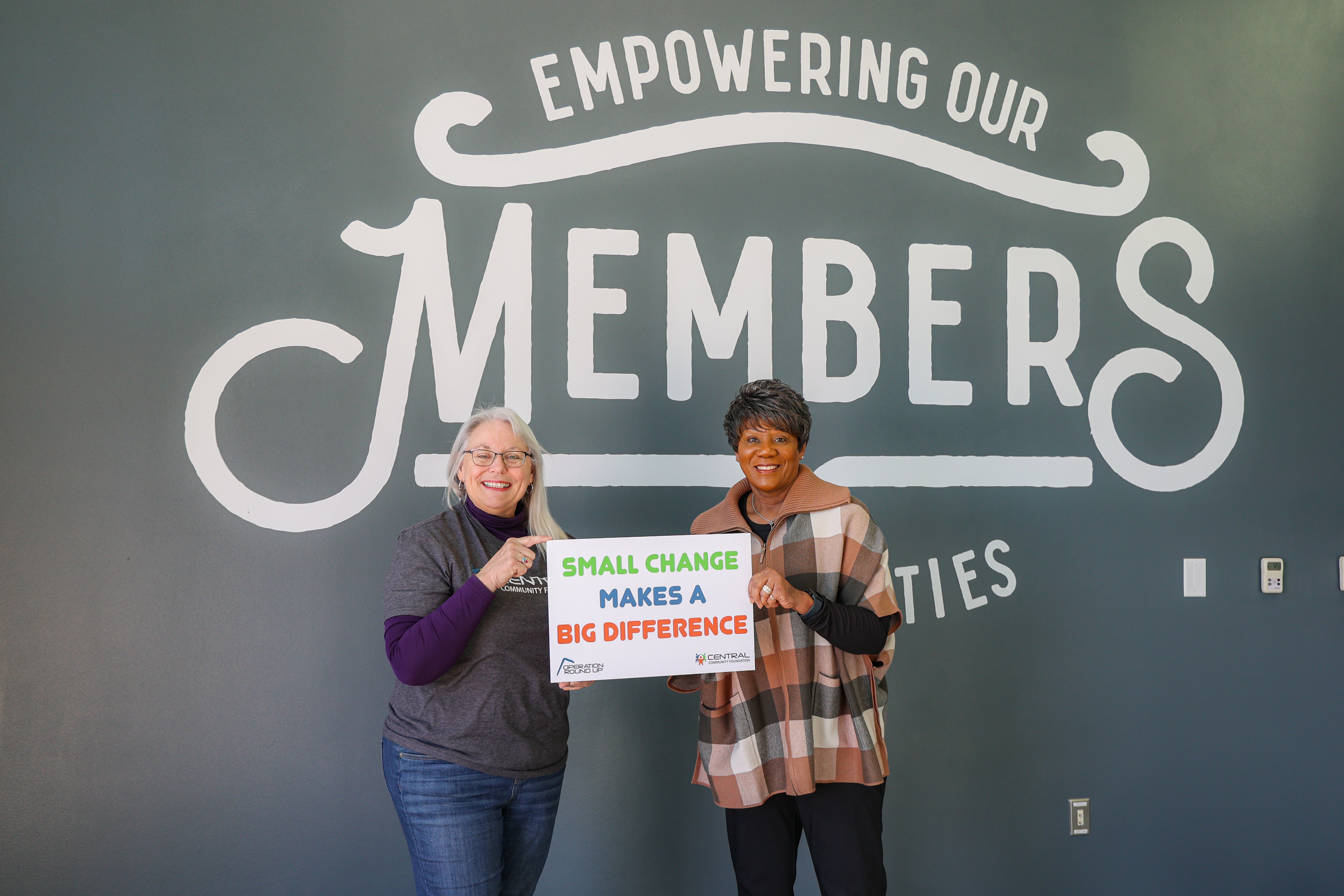 Central Community Foundation board member Donna Dollins presented About Face Women’s program director, Dee Miller, with a grant. 