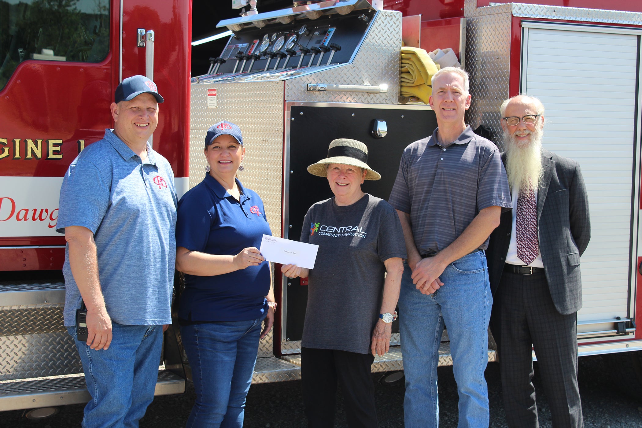 (From left to right) Robbie Clark, Carney fire chief; Sarah Smith, Carney firefighter; Peggy Wolfe, Central Foundation board member; Craig Wolfe, Carney vice mayor; and Stu Preston, Central district 2 trustee.