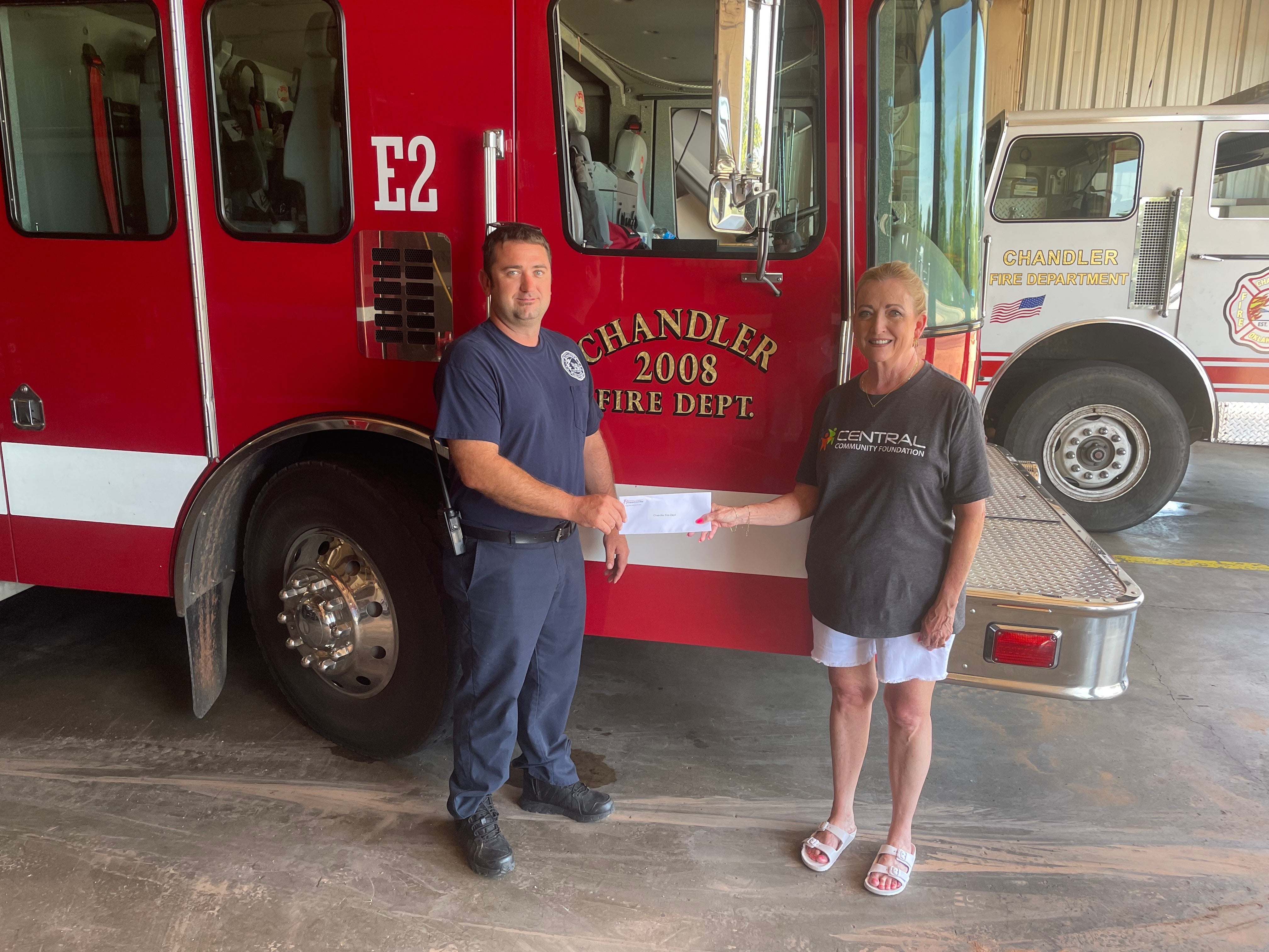 Pictured are Bobby Buchanan, Chandler Fire Department fire chief and Gretchen Harlow, Central Community Foundation director.