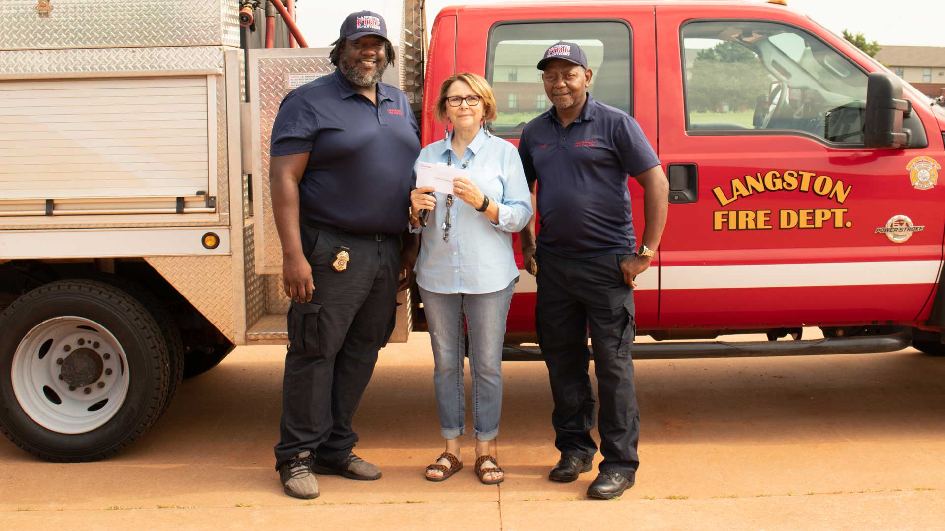 Langston Fire Department receives Central Foundation Grant. Pictured are Langston Fire Department Lieutenant, Morgan Smith; Janie Carey, Community Foundation Board Member; and Fire Chief, Clint Winfrey.